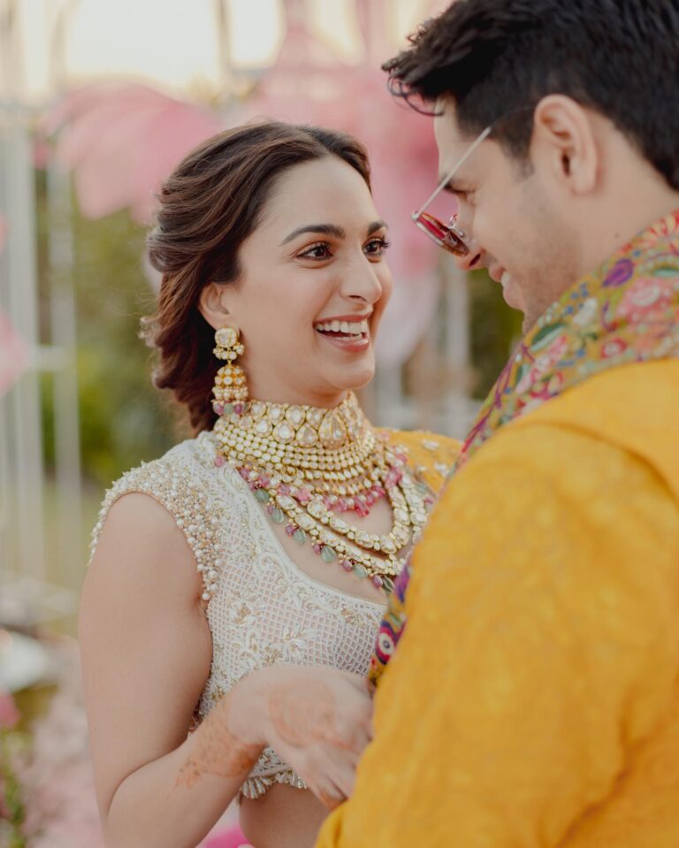 Kiara Advani and Sidharth Malhotra twinned elegantly as they continued their Manish Malhotra streak in yellow outfits for their mehendi