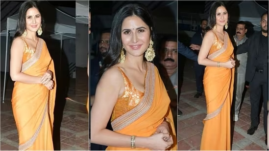 Katrina Kaif steals hearts in a stunning orange saree, effortlessly blending tradition and glamour. 