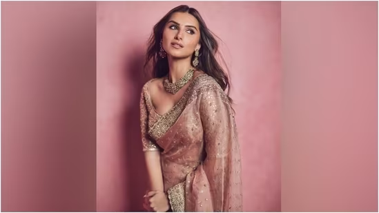 Tara Sutaria drops the ultimate engagement outfit in pink saree; aces the minimal ethnic look